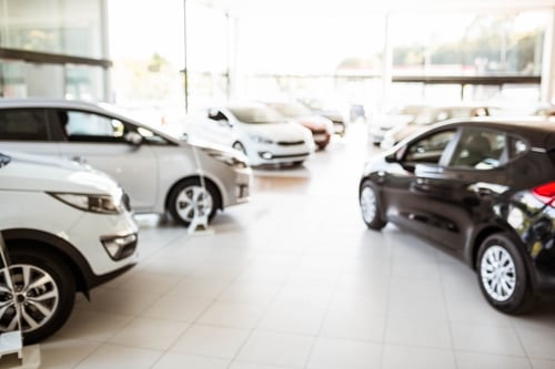 View of row new car at car dealership-1